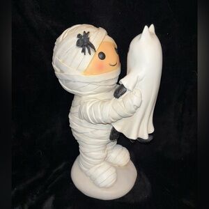Mummy Holding A Ghost Cat Figurine